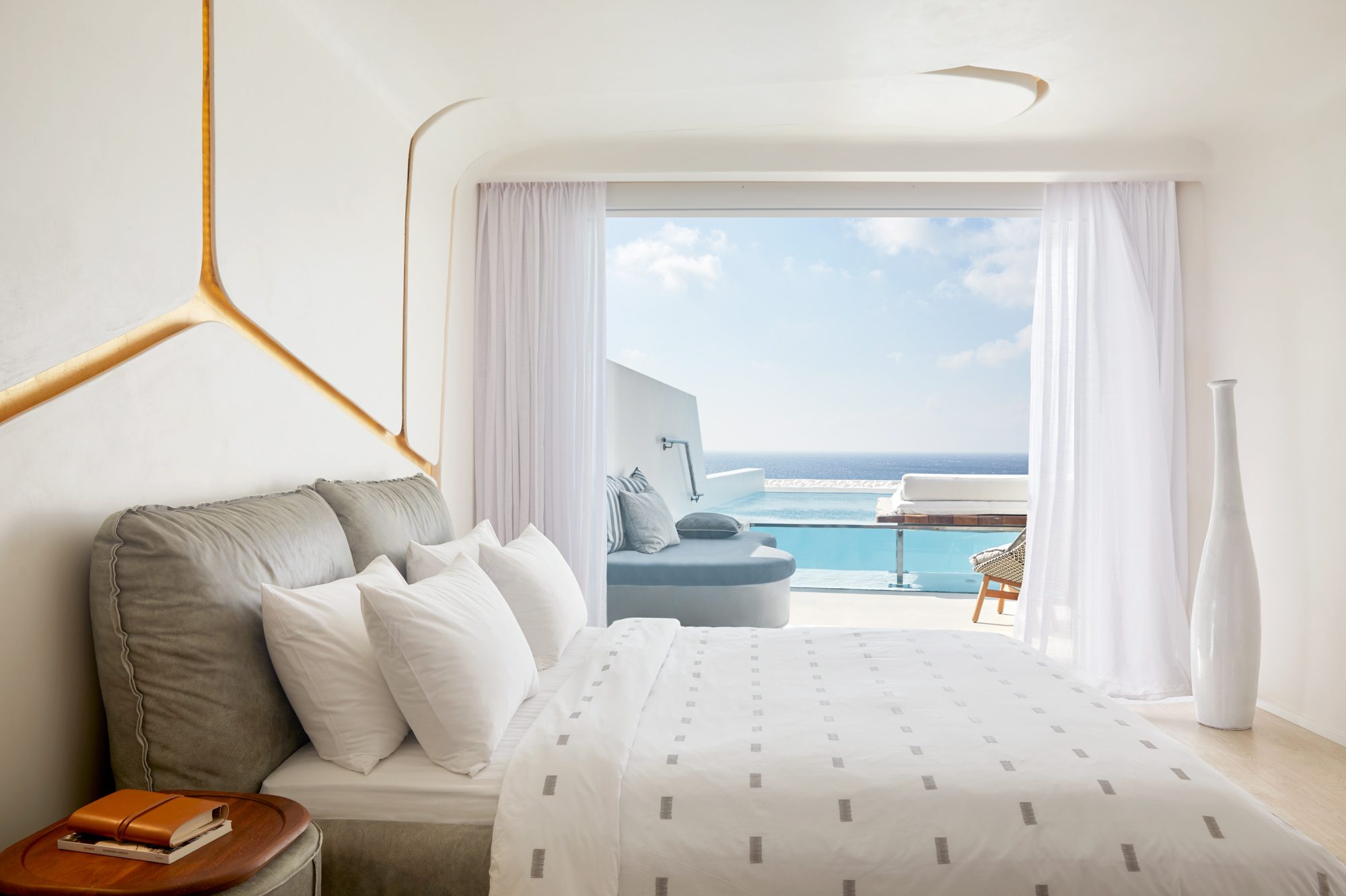 Immerse in the vibrant spirit of Mykonos at the captivating Cavo Tagoo Resort