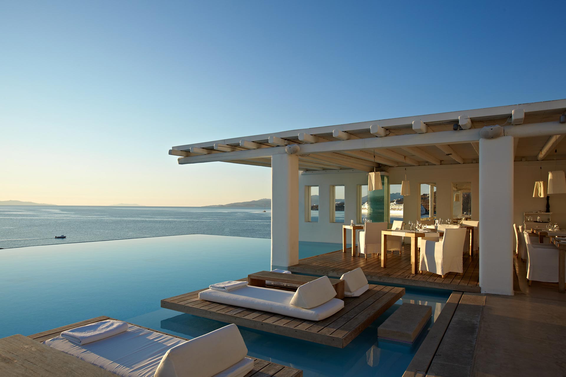 Immerse in the vibrant spirit of Mykonos at the captivating Cavo Tagoo Resort