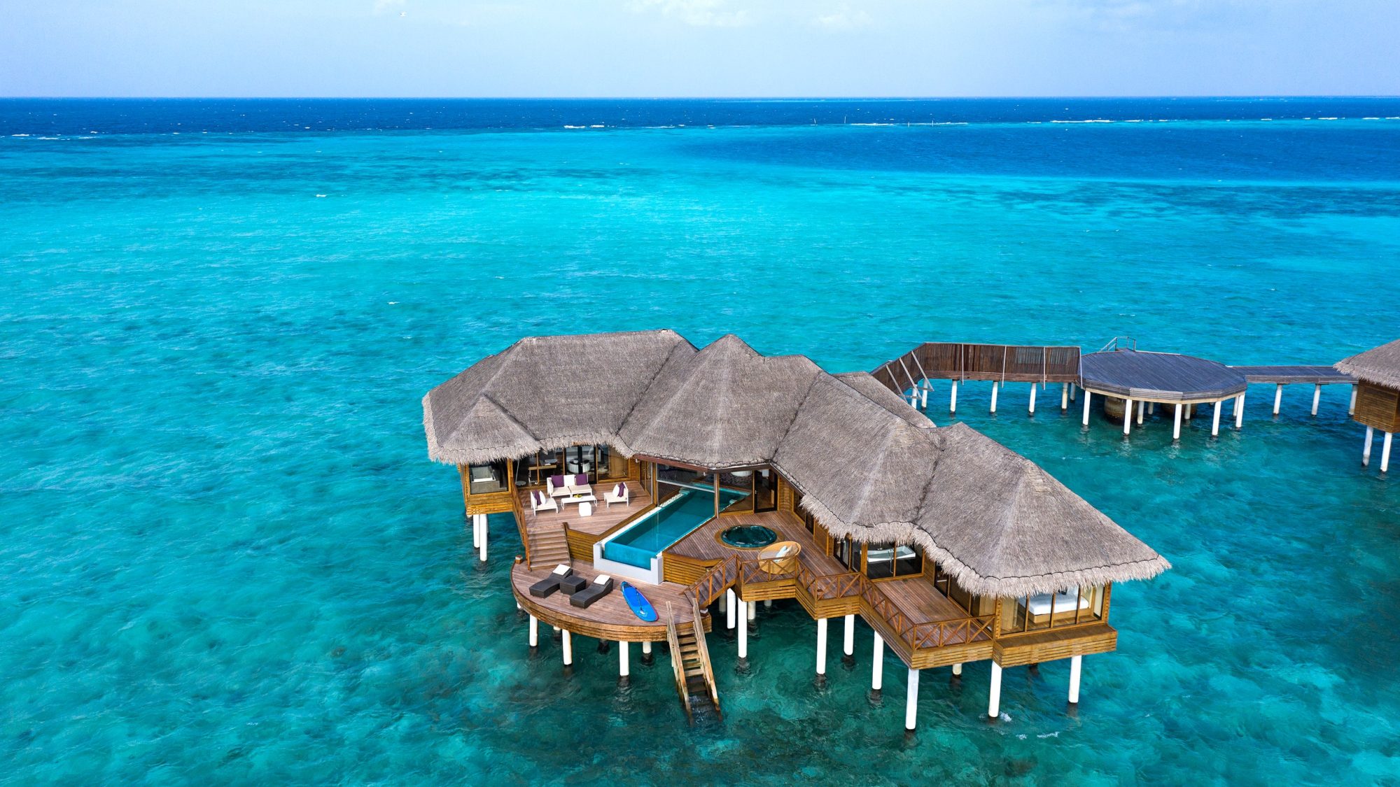 Bask in tropical splendor at the Huvafen Fushi Resort in Maldives